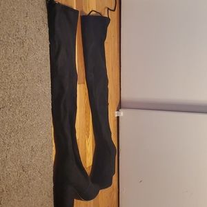 Thigh high heeled boots
